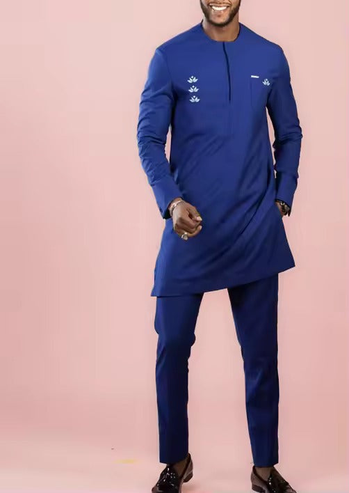 Bold royal blue African men’s  Dashikie kaftan outfit. Perfect attire for weddings, church, and